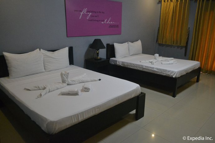 Imagen de la habitación del Hotel The Q Hotel and Restaurant. Foto 3