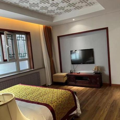Imagen de la habitación del Hotel The Qomolangma Hotel Beijing China. Foto 7