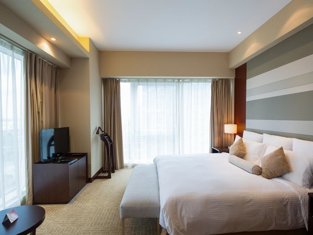 Imagen de la habitación del Hotel The Qube. Foto 8