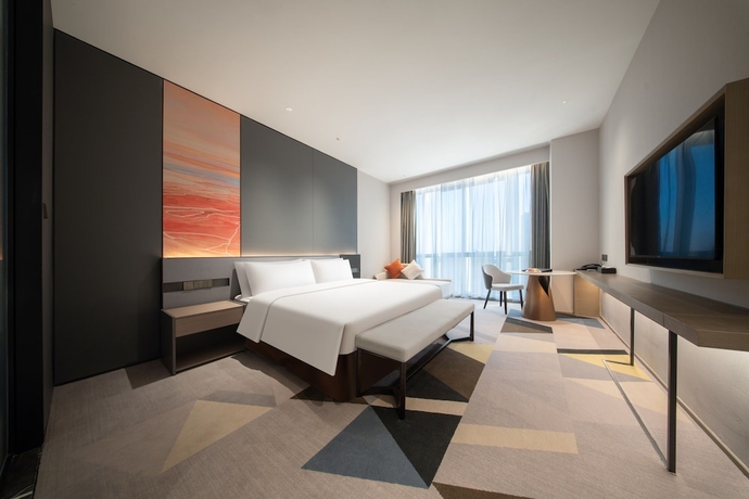Imagen de la habitación del Hotel The Qube Jinan Intl Expo. Foto 2