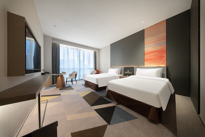Imagen de la habitación del Hotel The Qube Jinan Intl Expo. Foto 4