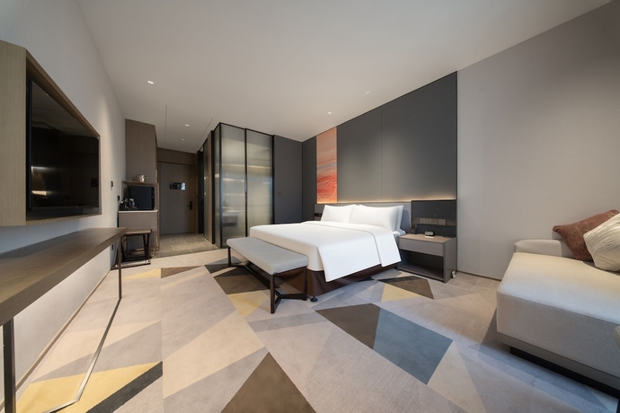 Imagen de la habitación del Hotel The Qube Jinan Intl Expo. Foto 6