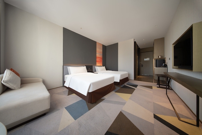 Imagen de la habitación del Hotel The Qube Jinan Intl Expo. Foto 8
