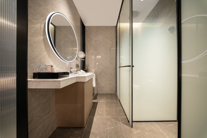 Imagen de la habitación del Hotel The Qube Jinan Intl Expo. Foto 9