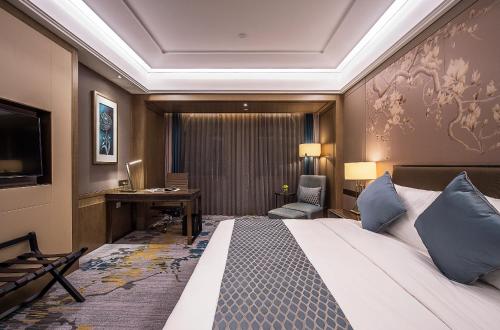 Imagen de la habitación del Hotel The Qube Nanchang East. Foto 4