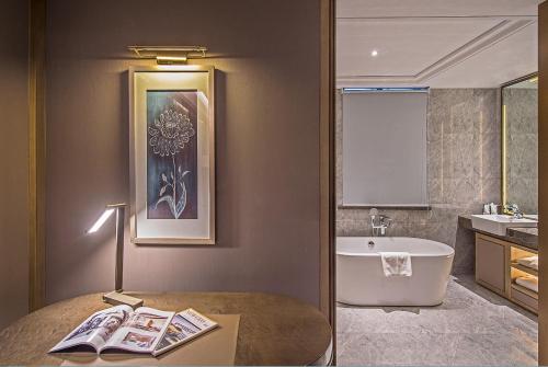 Imagen de la habitación del Hotel The Qube Nanchang East. Foto 5