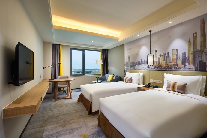 Imagen de la habitación del Hotel The Qube Shanghai Sanjiagang. Foto 4
