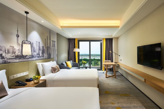 Imagen de la habitación del Hotel The Qube Shanghai Sanjiagang. Foto 5