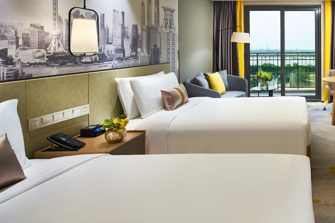 Imagen de la habitación del Hotel The Qube Shanghai Sanjiagang. Foto 9