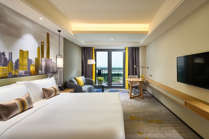 Imagen de la habitación del Hotel The Qube Shanghai Sanjiagang. Foto 12