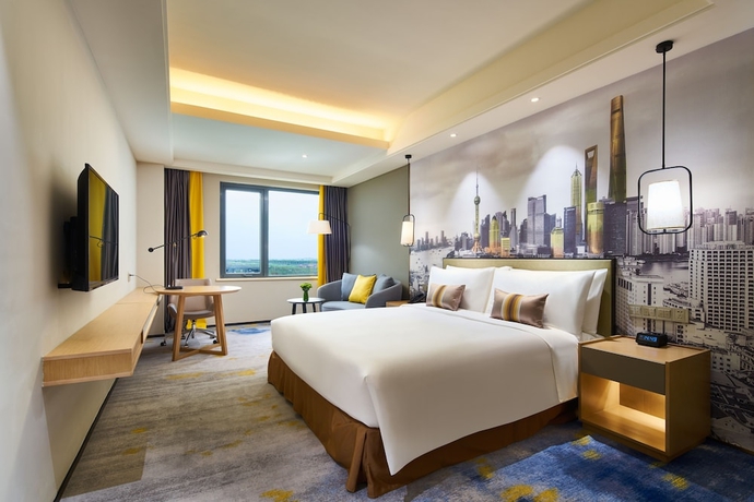 Imagen de la habitación del Hotel The Qube Shanghai Sanjiagang. Foto 18