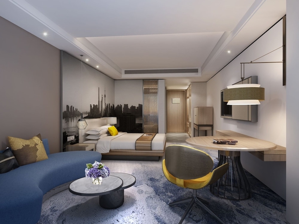 Imagen de la habitación del Hotel The Qube Shanghai Sanjiagang. Foto 19