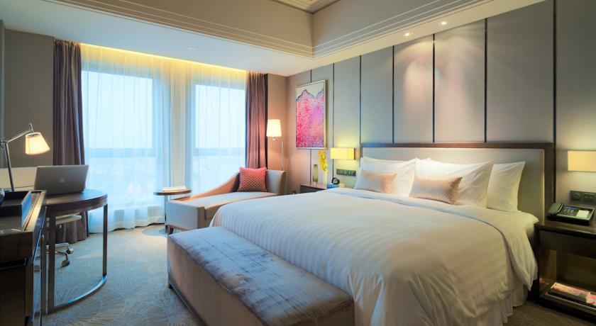Imagen de la habitación del Hotel The Qube Shanghai Xinqiao. Foto 5