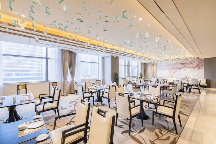 Imagen del bar/restaurante del Hotel The Qube Xiangyang. Foto 2