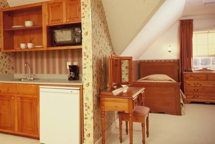 Imagen de la habitación del Hotel The Queen Anne. Foto 16