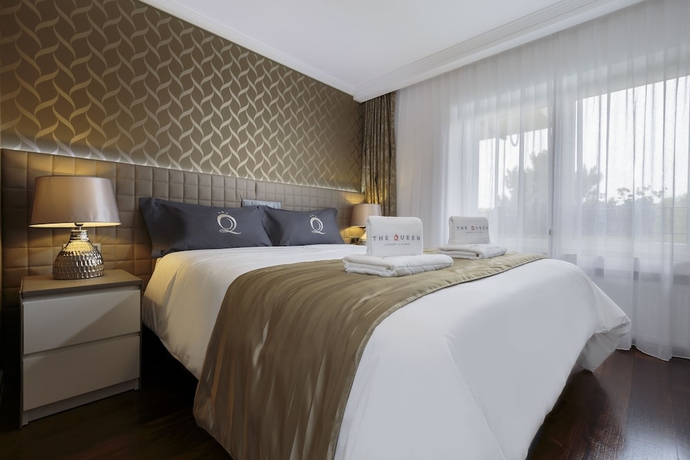Imagen de la habitación del Hotel The Queen Luxury Apartments Villa Vinicia. Foto 3