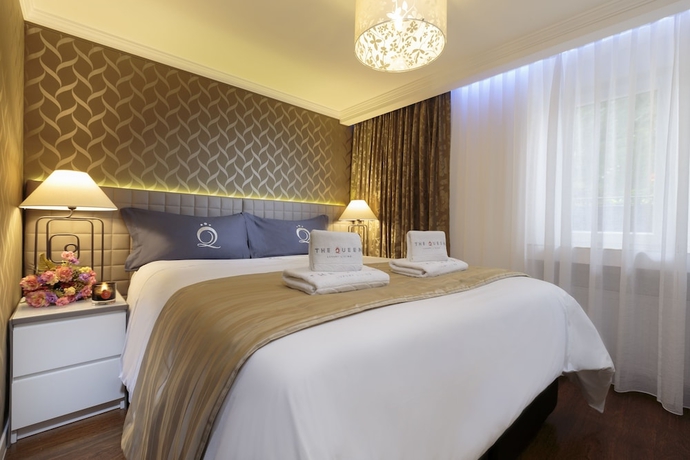 Imagen de la habitación del Hotel The Queen Luxury Apartments Villa Vinicia. Foto 5