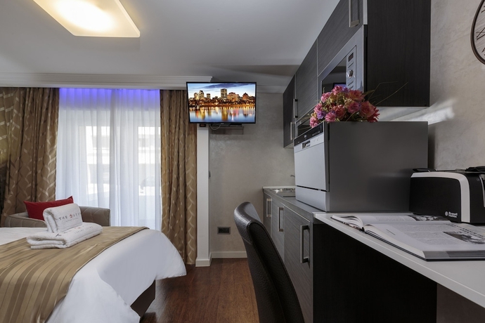 Imagen de la habitación del Hotel The Queen Luxury Apartments Villa Vinicia. Foto 11