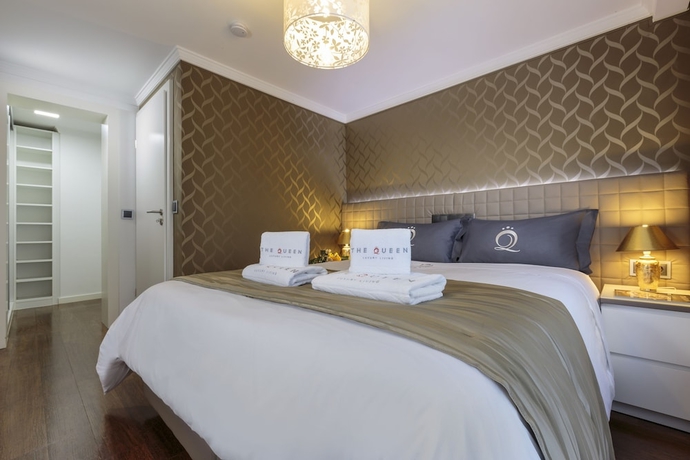 Imagen de la habitación del Hotel The Queen Luxury Apartments Villa Vinicia. Foto 17