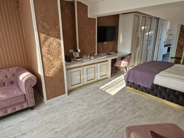 Imagen de la habitación del Hotel The Queen Palace. Foto 13