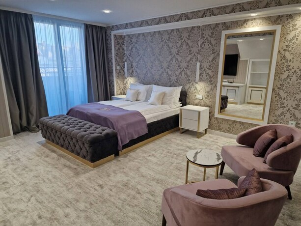 Imagen de la habitación del Hotel The Queen Palace. Foto 16