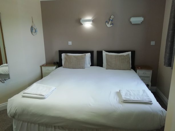Imagen de la habitación del Hotel The Queen Phillippa. Foto 4