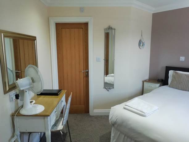 Imagen de la habitación del Hotel The Queen Phillippa. Foto 12