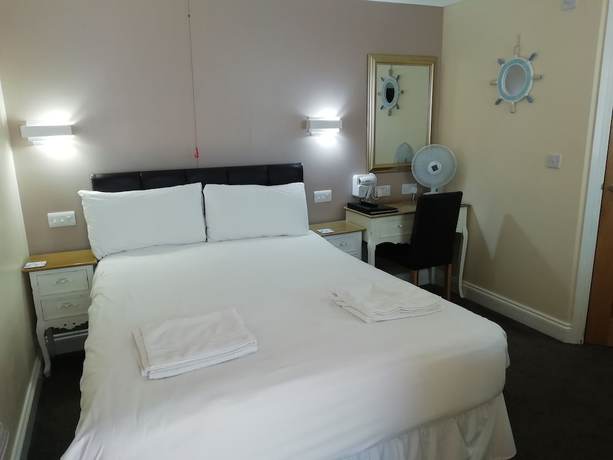 Imagen de la habitación del Hotel The Queen Phillippa. Foto 16