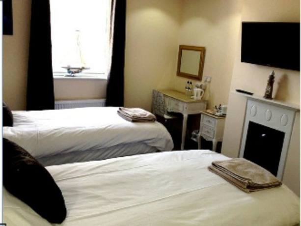 Imagen de la habitación del Hotel The Queen Phillippa. Foto 18