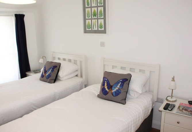 Imagen de la habitación del Hotel The Queens Head. Foto 5