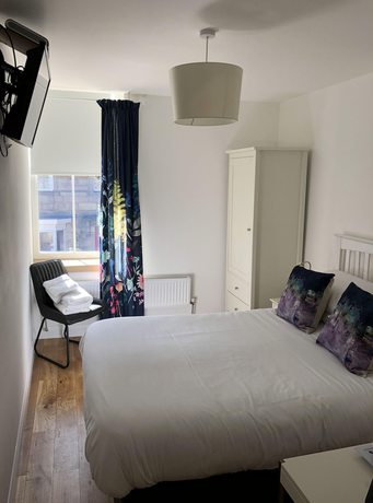 Imagen de los interiores del Hotel The Queens Head. Foto 19