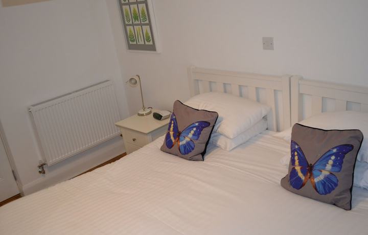 Imagen de la habitación del Hotel The Queens Head. Foto 15