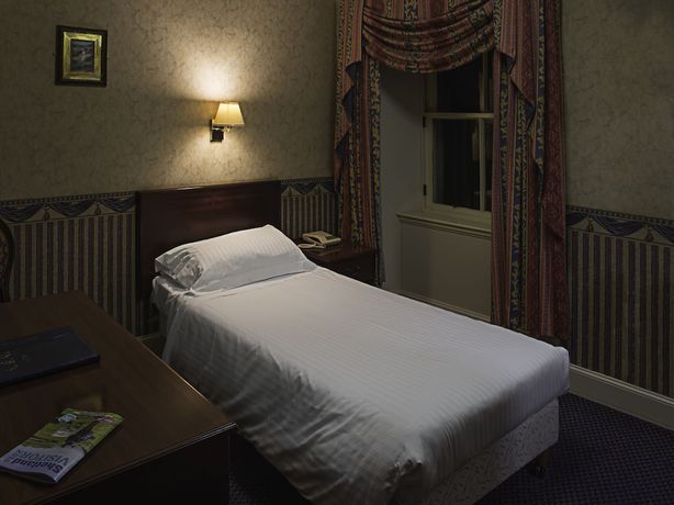 Imagen de la habitación del Hotel The Queen's Hotel. Foto 10