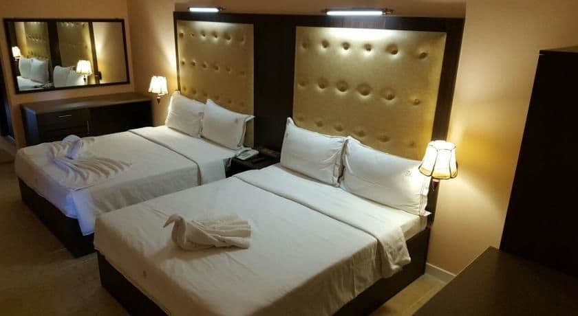 Imagen de la habitación del Hotel The Queensburry City. Foto 7