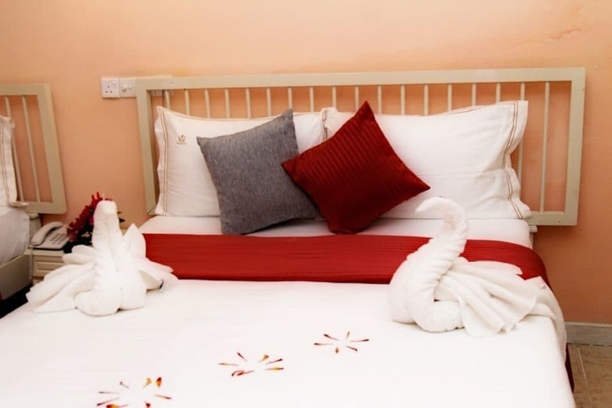 Imagen de la habitación del Hotel The Queensburry City. Foto 8
