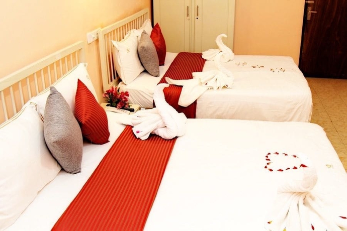 Imagen de la habitación del Hotel The Queensburry City. Foto 9