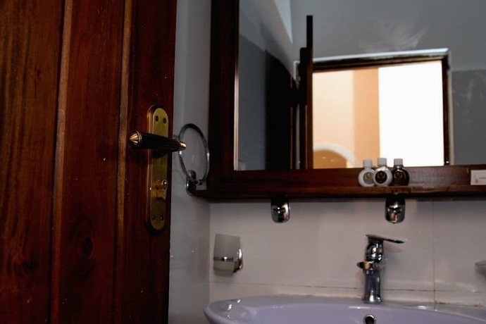 Imagen de la habitación del Hotel The Queensburry City. Foto 10