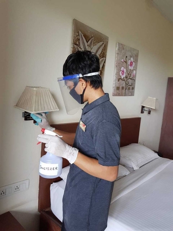 Imagen de la habitación del Hotel The Queeny. Foto 11