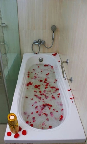 Imagen de la habitación del Hotel The Queeny. Foto 13