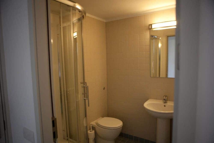 Imagen de la habitación del Hotel The Quigley Residence. Foto 8