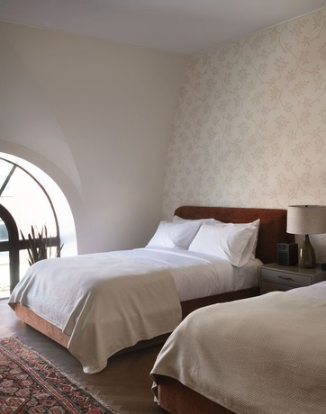 Imagen de la habitación del Hotel The Quoin. Foto 10