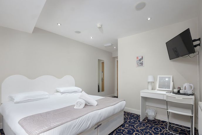 Imagen de la habitación del Hotel The R Inn. Foto 4