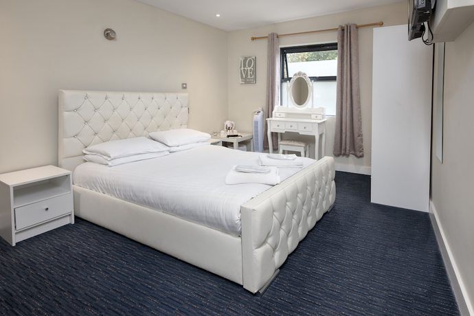 Imagen de la habitación del Hotel The R Inn. Foto 5