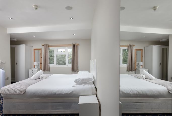 Imagen de la habitación del Hotel The R Inn. Foto 9