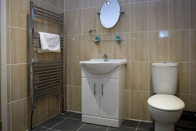 Imagen de la habitación del Hotel The R Inn. Foto 11