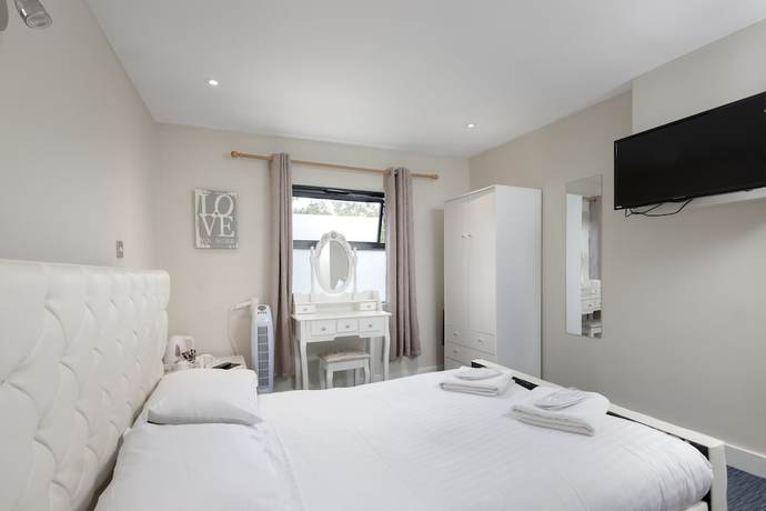 Imagen de la habitación del Hotel The R Inn. Foto 12