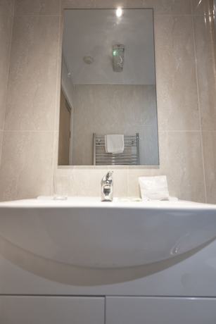 Imagen de la habitación del Hotel The R Inn. Foto 16