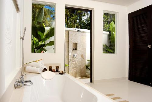 Imagen de la habitación del Hotel The Racha. Foto 14