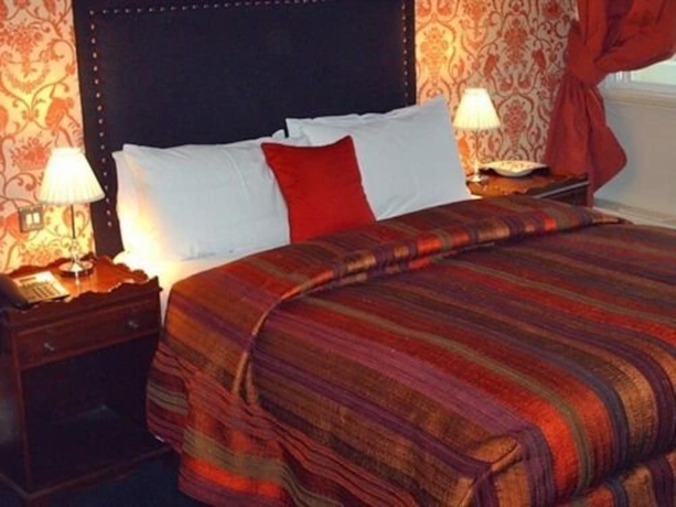 Imagen de la habitación del Hotel The Racquet Club. Foto 7