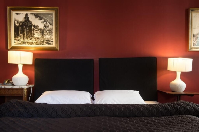 Imagen de la habitación del Hotel The Racquet Club. Foto 8